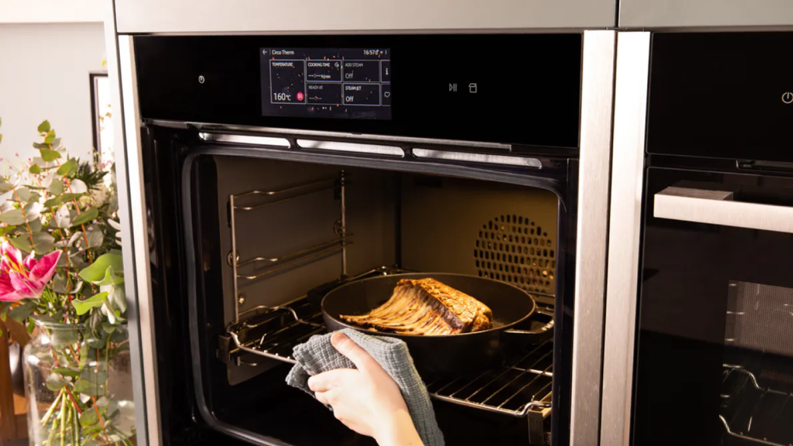 A rack of lamb getting cooked in a NEFF oven. It has a Multi Point Meat Probe inserted in it.