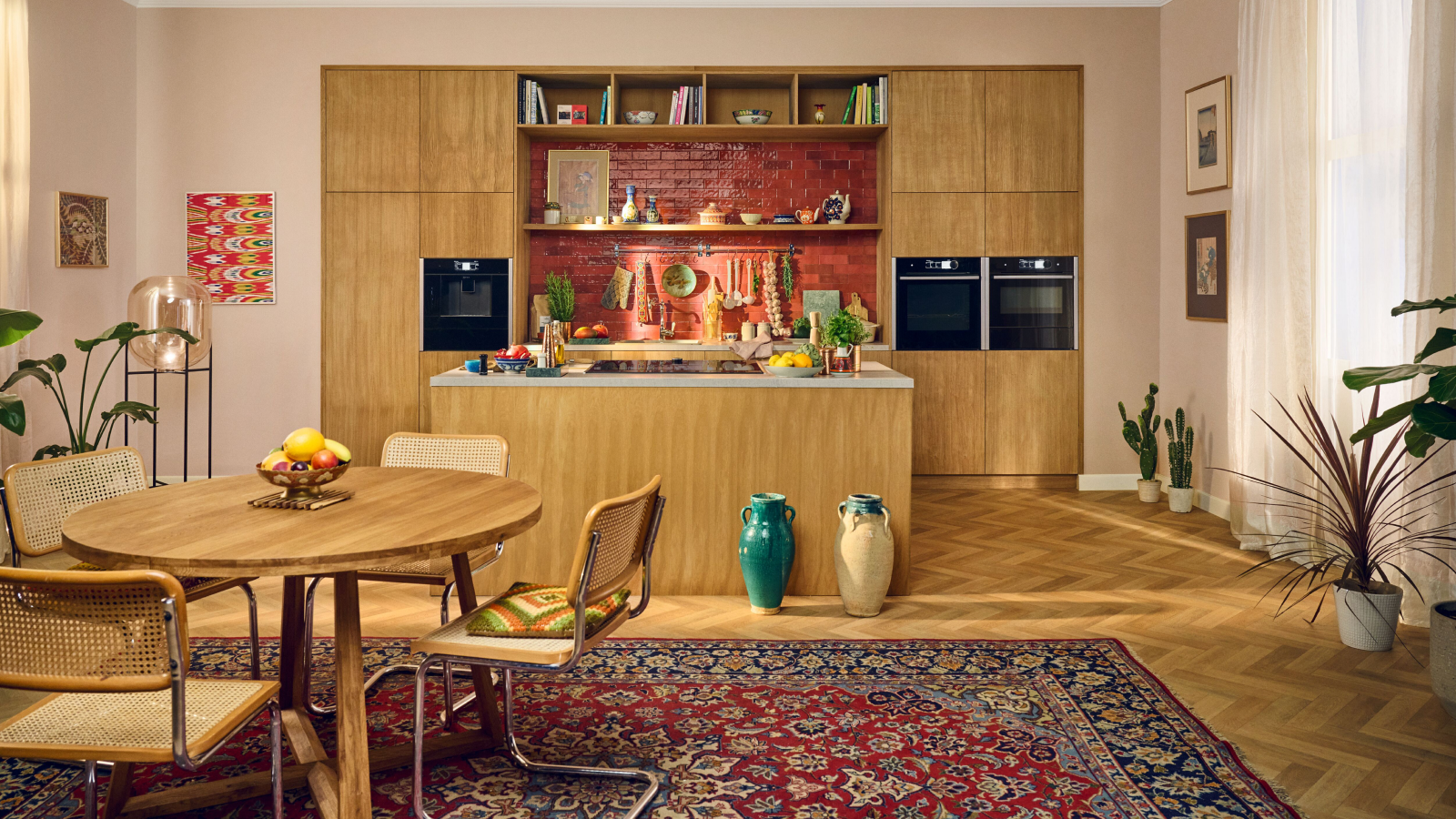 An eclectic colourful kitchen with NEFF appliances